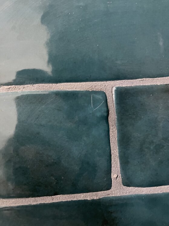 Help needed please! What could have caused scratches to these tiles? | TilersForums.com Filename: {userid}