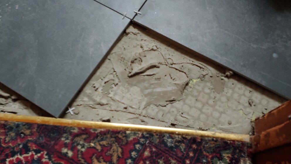 Is This A Bad Bathroom Tiling Job: Suspect Prep + Toilet Now Slopes | TilersForums.com Filename: {userid}