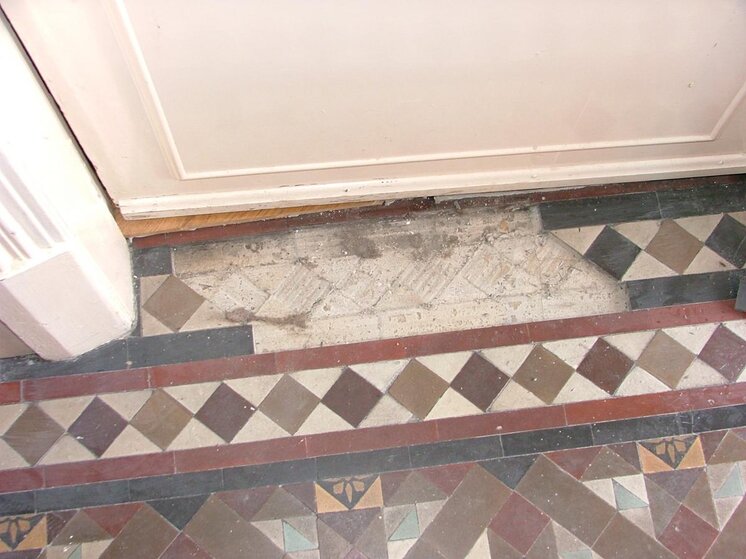 Pw section of tiles lifted.jpg