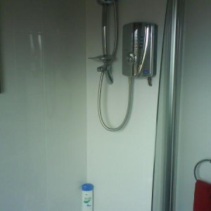 showing off, i fitted the shower and shower screen also all the towel and loo roll holders and glass shelf and mirror.
