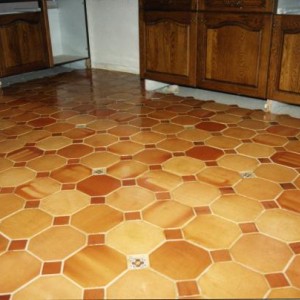 French octagonal terracotta on a kitchen floor.