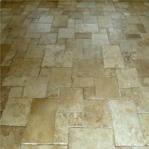 Chipped edge travertine and Tumbled travertine mixed together and fitted in opus pattern