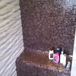 Bisazza and natural stone wetroom.