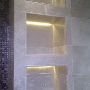 Bisazza and natural stone wetroom.