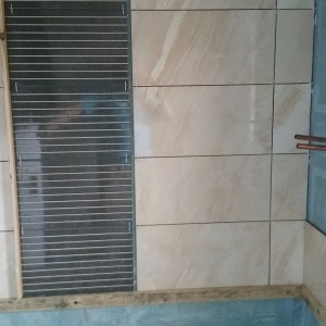 Bathroom with central panel