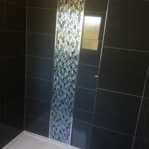 Mosaic feature in shower
