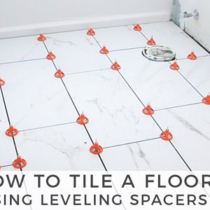 Small bathroom floor tiling with lash clips