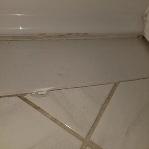 bathroom flooring gap.jpg