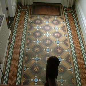 b4collingham this floor was covered in bitumen then had newspapers pressed into the tar it was really bad the client tried to remove above with gallons of white spirit.

The floor screed was shot so all the tiles bar the borders were removed and new tiles = all the buff were cut as they had absorbed too much tar to get clean again.