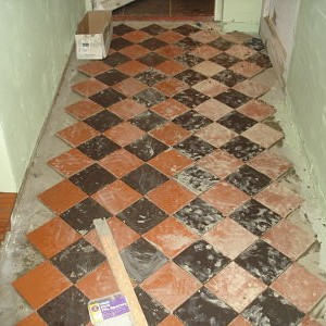 Cloister 12 - at last finished the main bit. Just the cuts, cleaning and grouting to go....... My knees hurt and my fingers are cold - why didn't I just get a pro in......