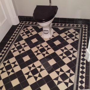 CLOAKROOM - Handcut 100x100mm black/white to traditional design.
