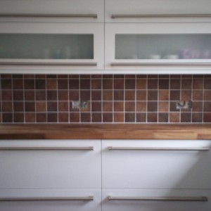 A good contrast of how old rustic tiles can look good with new contempary units.