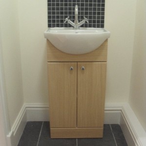 Small toilet area 
Porcelain floor & ceramic splashback