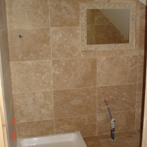 F&H Travertine bathroom 60x40 with mosaic & pencil border at the mirror