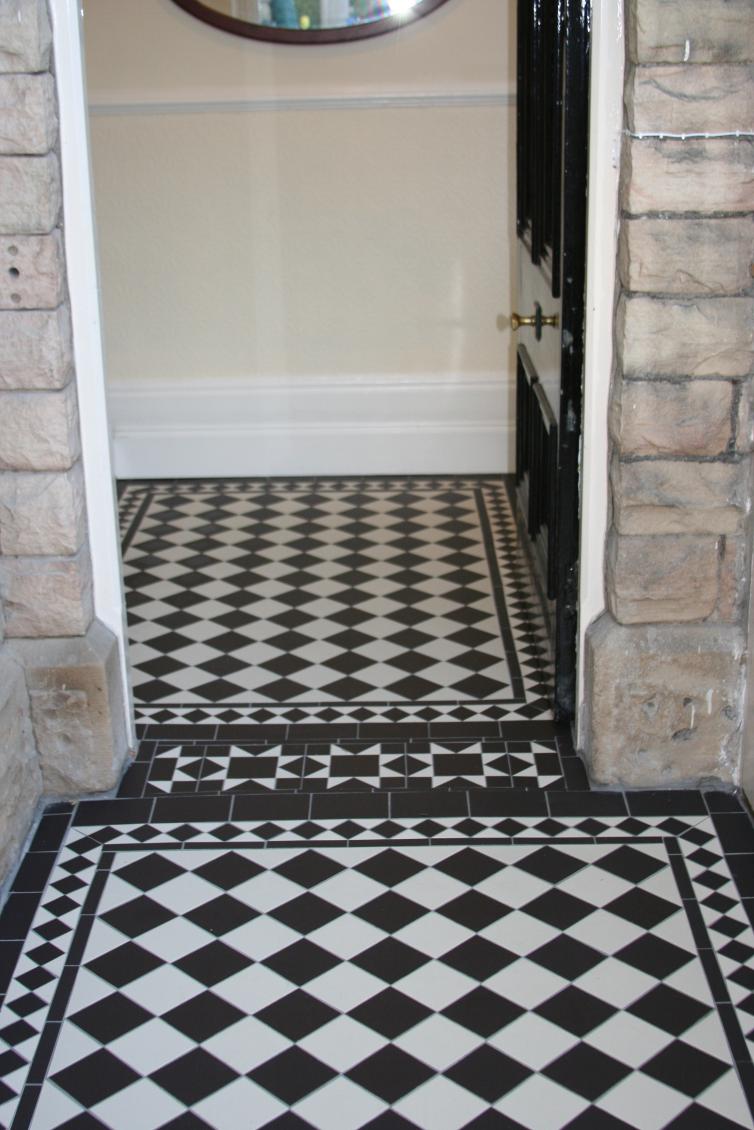 inner porch & threshold This floor prior to our work was split level inner porch was terrazzo and a good two inches above outer porch with a concrete step. outer porch was brush finished concrete. we used Olde english tiles.