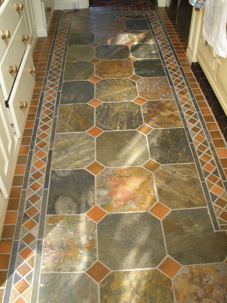 MULTI COLOUR SLATE/QUARRIES - APRIL 2009
Kitchen area part of a 30sqmt floor - every piece hand cut!
Mixed chinese/indian slate with 3 colour Ruabon quarries.